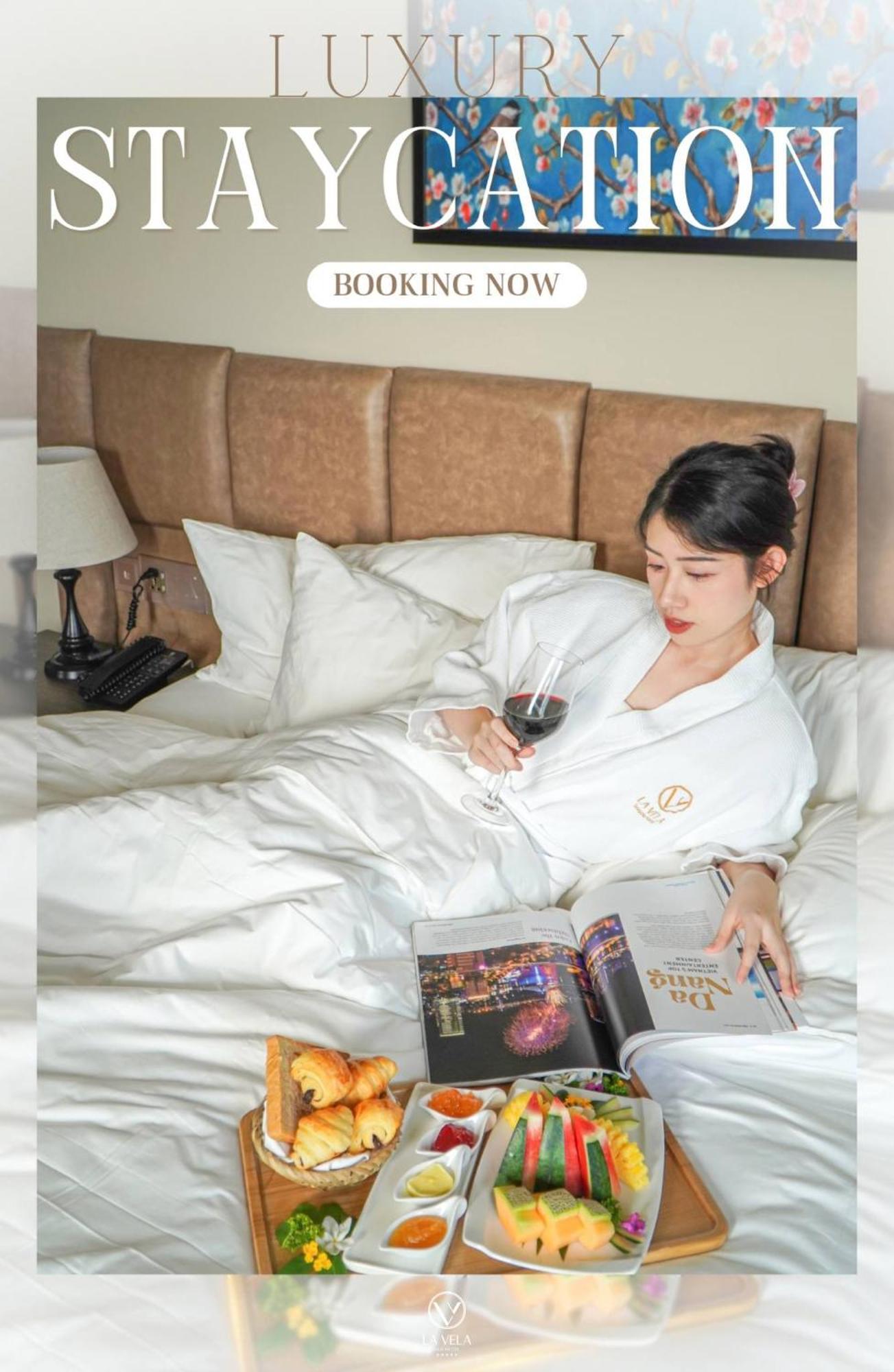 La Vela Hue Hotel エクステリア 写真 A woman wearing a bathrobe